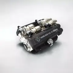 Potężny silnik V12-4T Mjolner od Zenvo, z turbosprężarkami i karbonową osłoną.