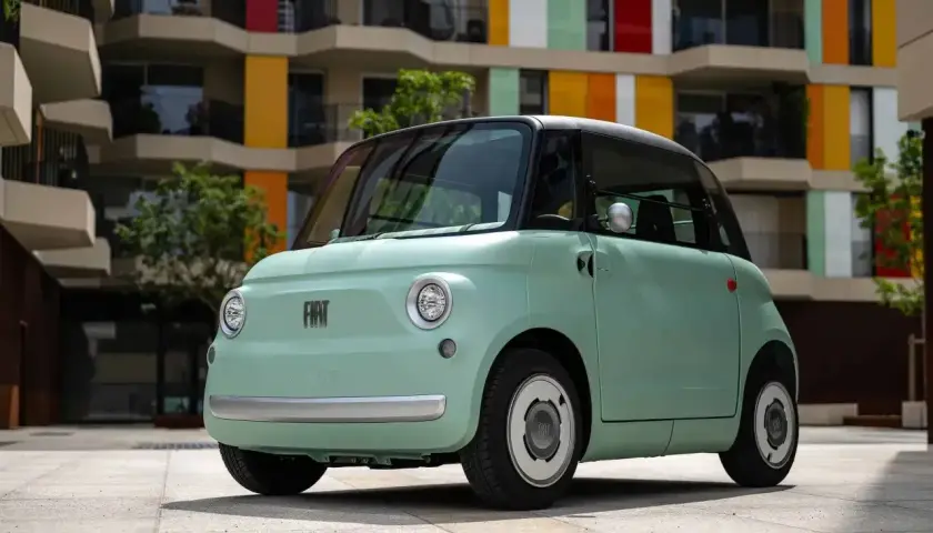 Miętowy Fiat Topolino, idealny do miasta. Sprawdź aktualną fiat topolino cena i daj się porwać stylowi!